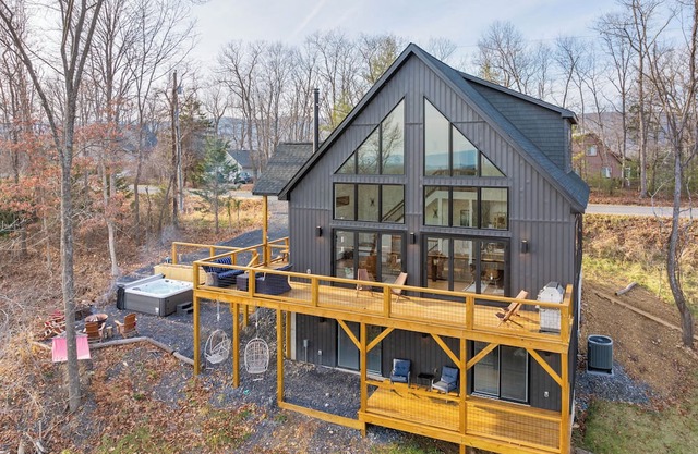 Charming 3-bedroom cabin with year-round views, hot tub, game room and more.