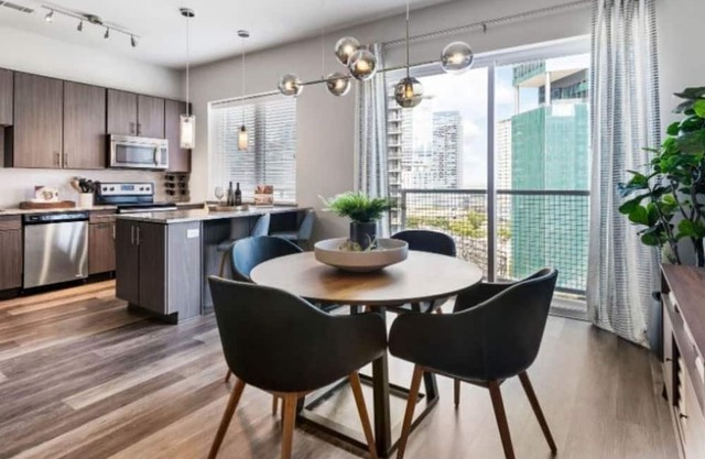 Modern 1BR Condo at Miro – Rooftop Pool & Fire Pit!