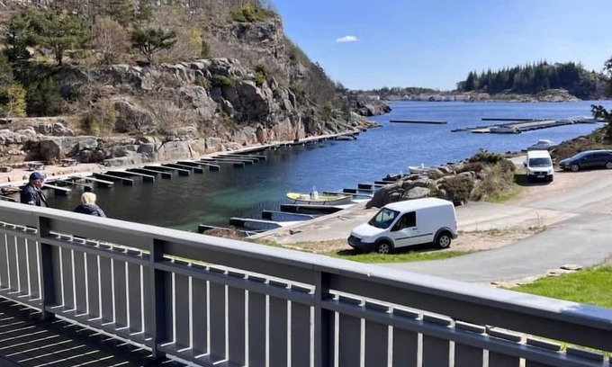 Lindesnes House | Holiday home Mona in Lussevika, new addition 2024, near Spangereid-Lindesnes, southern Norway, , max. 6 adults, own boat mooring, approx. 100 m² living space, 3 bedrooms, charming and tasteful furnishings, large veranda with fjord view, terrace f.