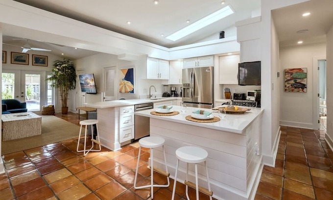 Midtown House | Banyan Rose: Relax in your backyard. All new appliances inside.