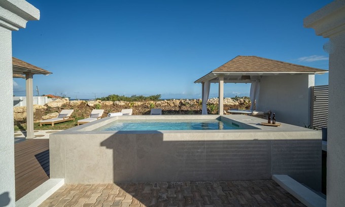 Belair Cottage | Serene, air-conditioned two-bedroom villa with plunge pool and ocean views.