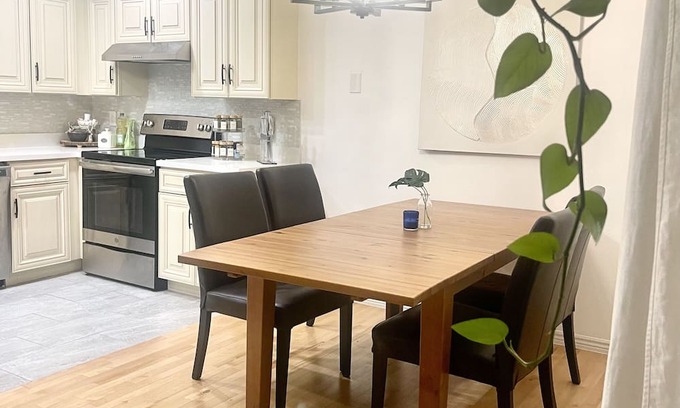 Thornton House | Modern 3 bed/2bath Townhome w 2 carports. 65inch TV/Fireplace/Wood Floors