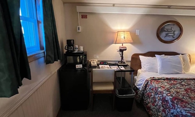 Onalaska House | Overlooking Lake Onalaska -- full-size bed + bath in nostalgic motel