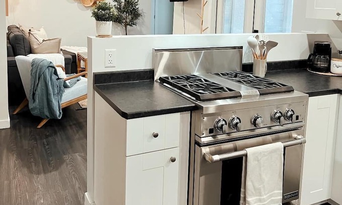 Kamloops House | Guest suite with cozy outdoor fire place and minutes from all local amenities