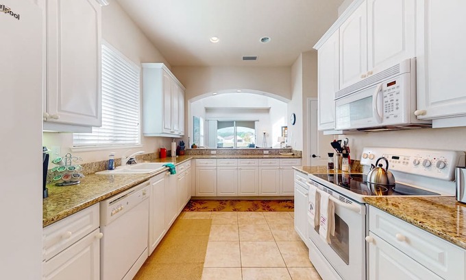 Halifax House | Corner-lot home with water view, on-site golf, enclosed patio, BBQ, & W/D