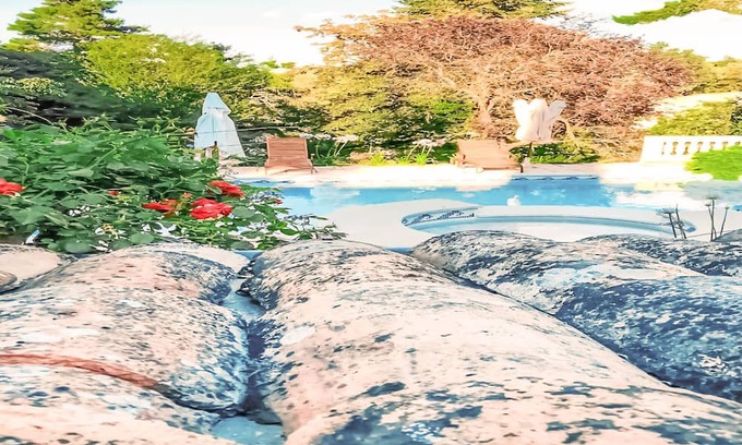 Laval-Pradel Apartment | Decorative and cozy vacation apartment with communal pool and idyllic garden.
