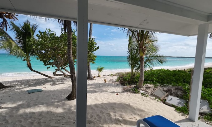 Rokers Point Apartment | 10 Short Steps From The Most Beautiful Sandy Beach & Crystal Clear Blue Ocean