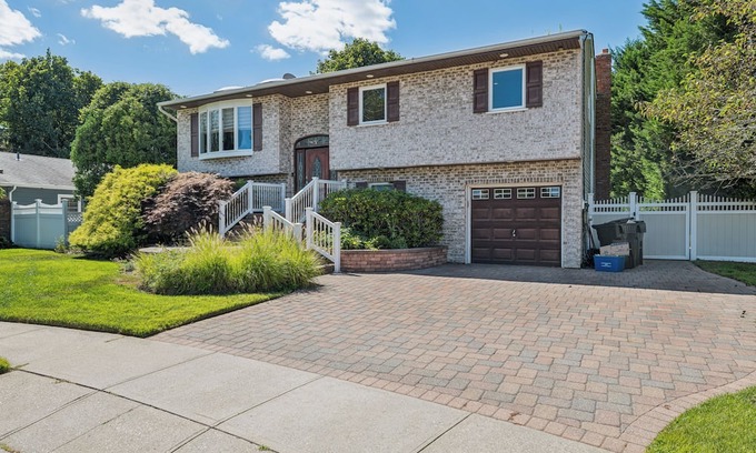 West Islip House | Relax in Style: Heated Pool, Golf Area, Gym & 2 Offices at Luxury Home